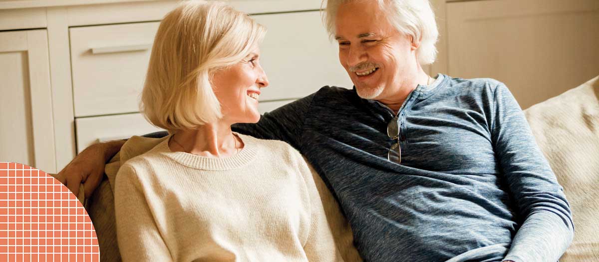 Senior couple smiling at eachother